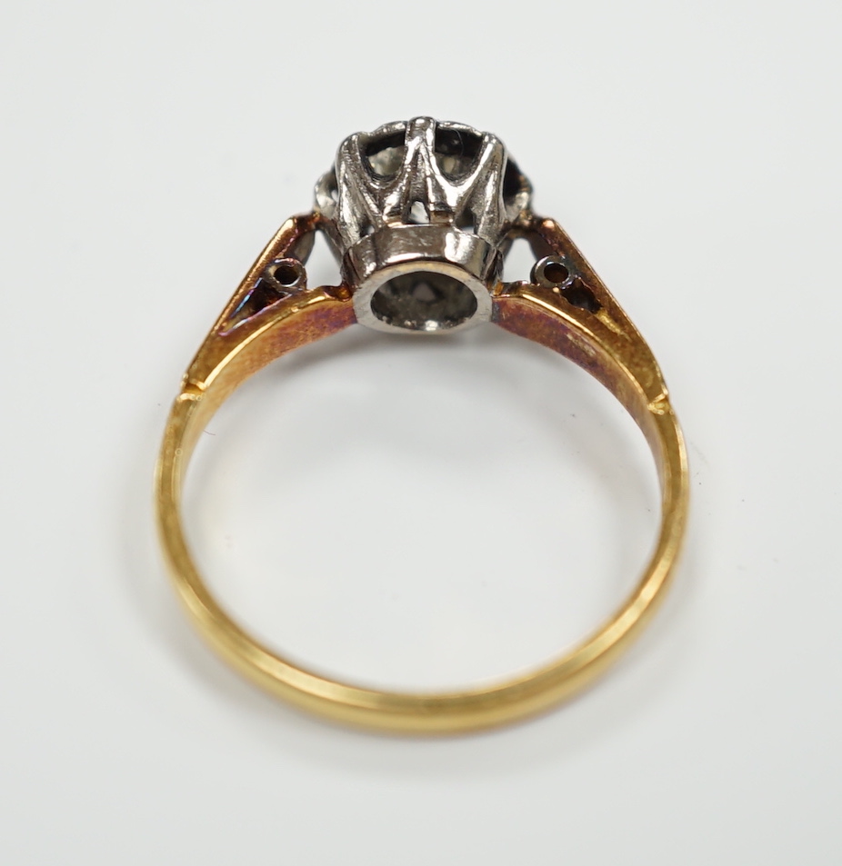 An 18ct, plat. and illusion set solitaire diamond ring, size J, gross weight 2.9 grams.